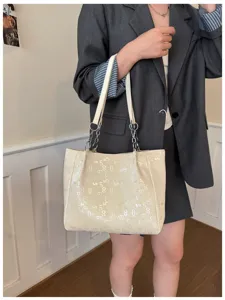 Large capacity beige shoulder tote bag for women, stylish commuting handbag with chain strap.