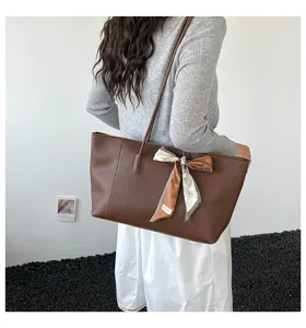 Elegante borsa shopper in pelle marrone con fiocco per donne, borsa a tracolla vintage.