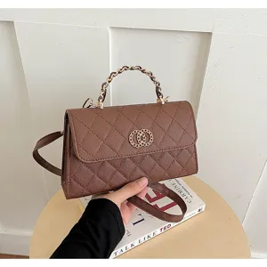 Brown quilted leather handbag with chain handle, elegant shoulder cross-body bag detail view.