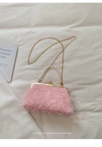 Sac pochette rose en dentelle de roses avec poignée perle et chaîne dorée pour femmes.