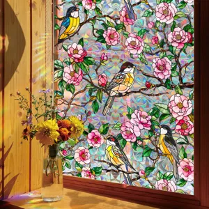 Detailed view of floral bird stained glass window film, showcasing vibrant rainbow light.