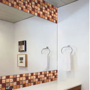 Detail view of waterproof mosaic tile sticker applied on bathroom wall mirror border.
