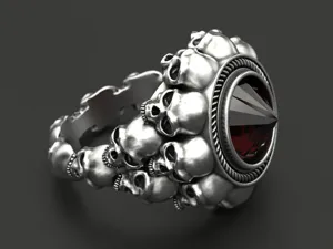 Anello teschio punk gotico in argento con gemma rossa sfaccettata vista dettagliata