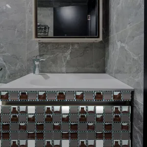 Mosaic tile sticker detail showing waterproof self-adhesive surface applied on bathroom cabinet.