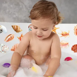Detailed view of cute seashell anti-slip stickers featuring ocean animals in a baby bathtub.