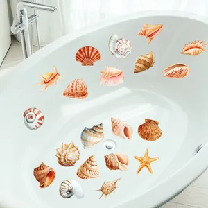 Close-up detail of anti-slip bathtub stickers featuring various seashell and starfish designs.