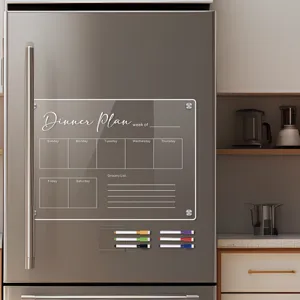 Clear acrylic magnetic weekly planner board for refrigerator with colorful markers.