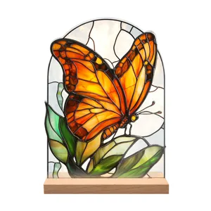 Stained glass butterfly acrylic ornament detail, colorful monarch butterfly decor for desk.
