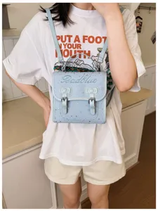 Zaino piccolo in pelle blu chiaro da donna, graziosa borsa scolastica con stelle moda.