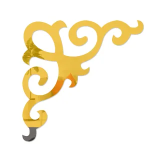 Gold mirror acrylic corner sticker detail view showing decorative scroll pattern design.
