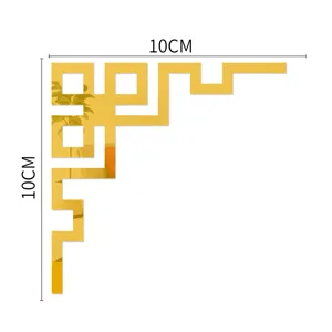Detailed view of the 10cm gold acrylic mirror corner wall sticker, geometric design.