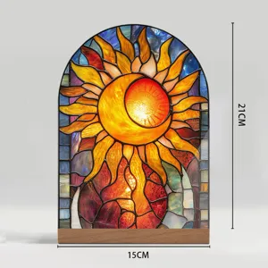 Stained glass style sun and moon acrylic desktop ornament with wood base for home decor.