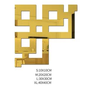 Gold acrylic mirror wall sticker detail view, geometric corner design for home decor display.