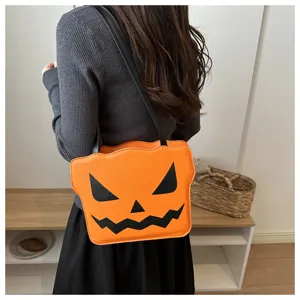 Detailed view of the Halloween pumpkin shoulder bag, cute spooky orange crossbody purse style.