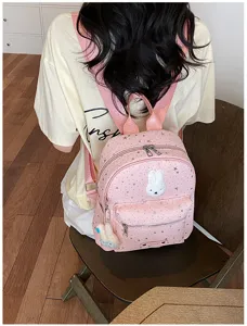 Cute pink mini backpack for women with stars pattern and lovely rabbit patch daily casual use.