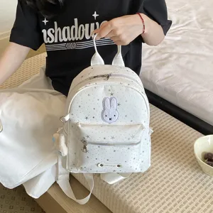 White mini backpack with star pattern and cute rabbit patch, casual daily bag for women and girls.
