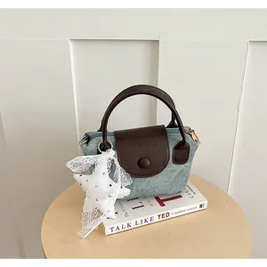 Koreanischer Stil Segeltuch Handtasche mit brauner Lederklappe und süßem weißem Sternanhänger.