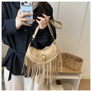 Vintage fringe crossbody bag for women, retro deerskin velvet shoulder bag with tassels.