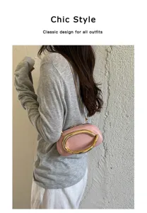 Chic pink shoulder bag for women, featuring a statement gold metal hardware and stylish strap.