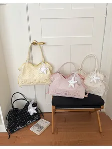 Korean style polka dot shoulder tote handbag for women, cute casual casual bag with star pendant.