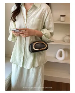 Fashion minimalist retro design women crossbody small black round bag chic detail