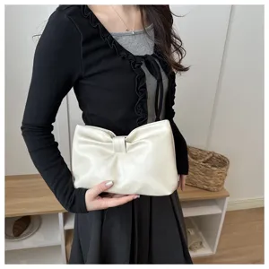 Stylish bow clutch bag for women, simple commuting underarm shoulder bag with chic design.