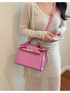 Bolso de mano Kelly con textura de avestruz rosa para mujer, elegante bolso cruzado.