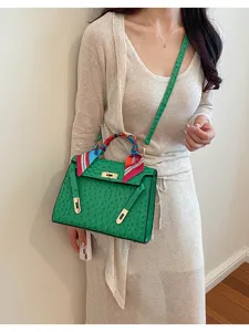 Green ostrich pattern Kelly bag, elegant women leather shoulder handbag with stylish colorful silk.