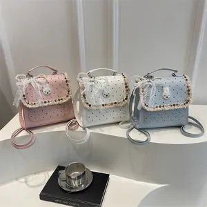 Cute polka dot bunny backpack for kids and women, stylish school bag with lace bow.