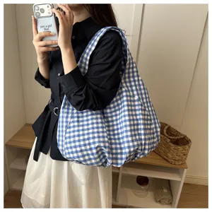 Casual blue and white checkered shoulder bag for women, trendy daily canvas tote bag.