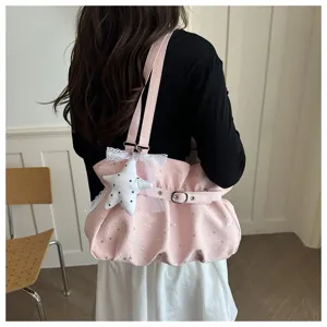 Chic pink star print shoulder bag for women, cute underarm bag with sweet star pendant and strap.