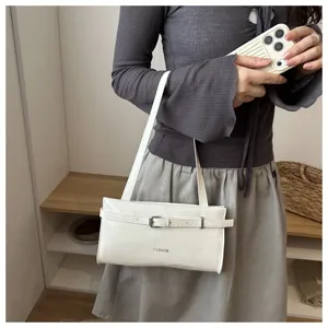 Women white underarm shoulder bag PU leather minimalist handbag with stylish belt buckle design.