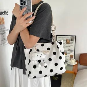 Fashion polka dot canvas shoulder bag casual tote handbag with cute cloud pendant for women.