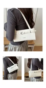 Details of white patent leather underarm shoulder bag showcasing stylish buckle and fine stitching.