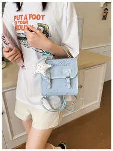 Zaino mini cartella con motivo a stelle azzurro chiaro da donna, borsa a tracolla con ciondolo a stella.