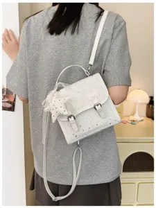 Mini zaino bianco in PU da donna, grazioso zainetto stellato con manico e ciondolo a stella.