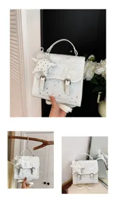 Mini zaino borsa in pelle bianca con stampa stelle fiocco e ciondolo stella da donna.