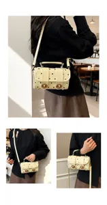 Detail view of the stylish yellow polka dot shoulder bag, perfect for daily commuting and fashion wear.