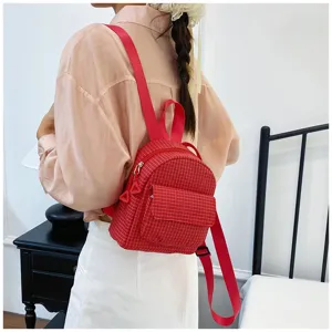 Red plaid mini backpack with front pocket, sweet style casual double shoulder school bag detail.