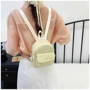 Detailed showcase of a sweet mini grid backpack worn on model, casual everyday fashion.