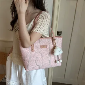 Stylish pink tote bag for women, large capacity shoulder bag with cute cloud pendant.