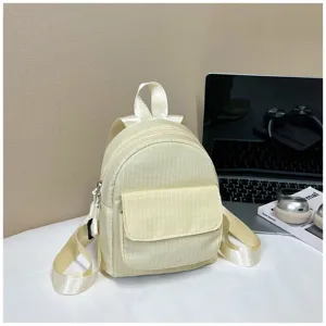 Detailed close-up view of the cute light yellow plaid mini backpack showing texture and strap.