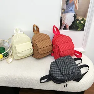 Casual small plaid backpack for women, fresh sweet style double shoulder bag for daily use.
