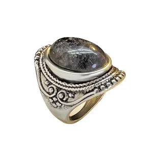 Vintage silver ring with dark gemstone and carved ethnic details for women daily wear