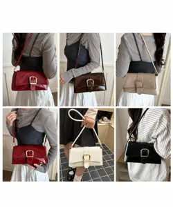 Vintage patent leather shoulder bag for women with chic metal buckle, elegant crossbody purse.