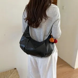 Black PU leather slouchy shoulder bag stylish retro pleated hobo handbag for daily commuter use.