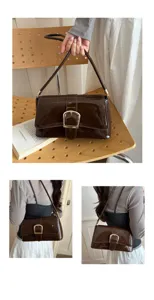 Vintage patent leather shoulder bag detail showing stylish metal buckle and crossbody wear style.
