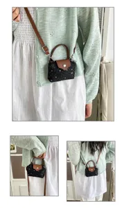Chic star print mini crossbody bag for women, cute shoulder handbag with top handle.
