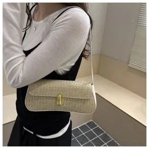 Korean style woven shoulder bag for women with gold lock closure and chic design.