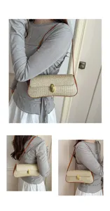 Stylish straw shoulder bag with metallic lock for women, perfect for daily commuting.